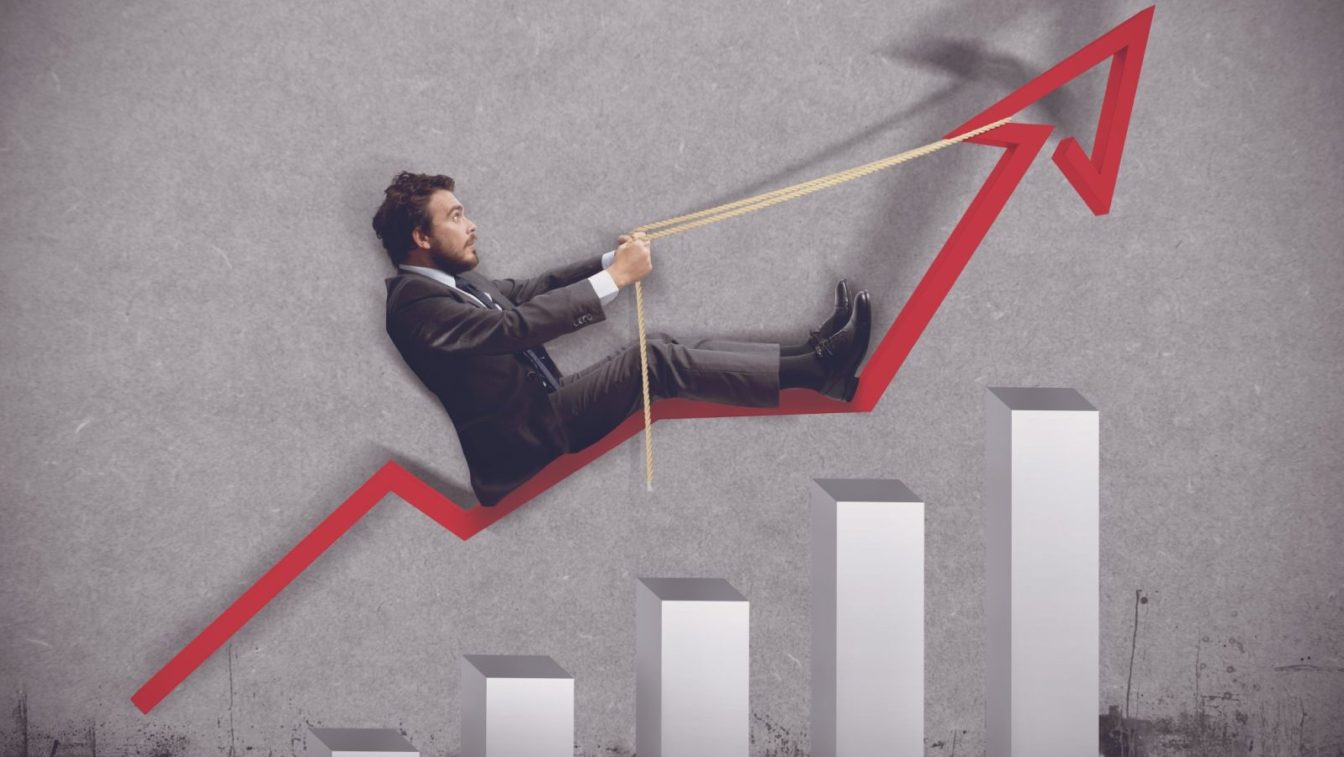 businessman rising graph