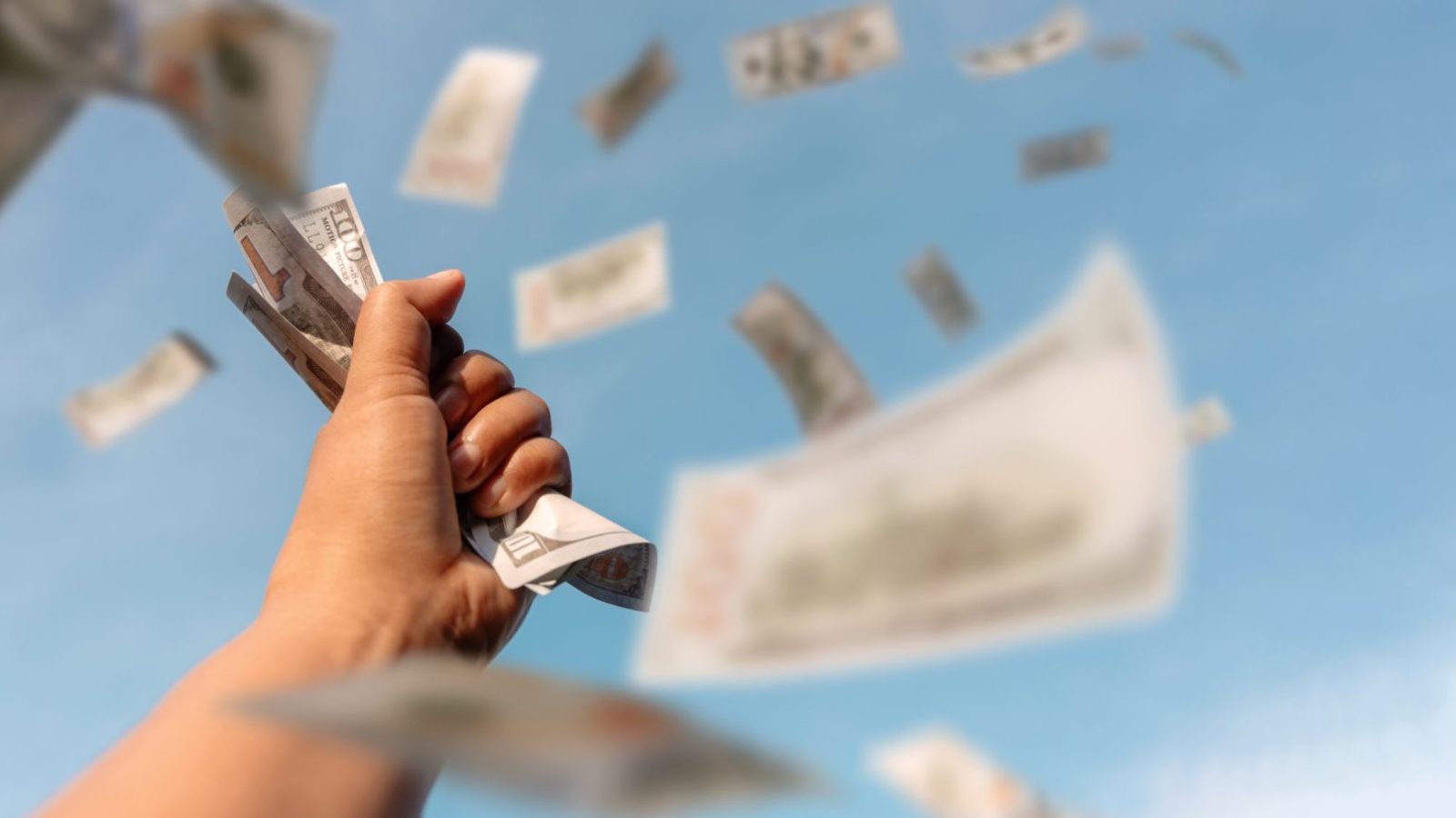 handful money falling sky